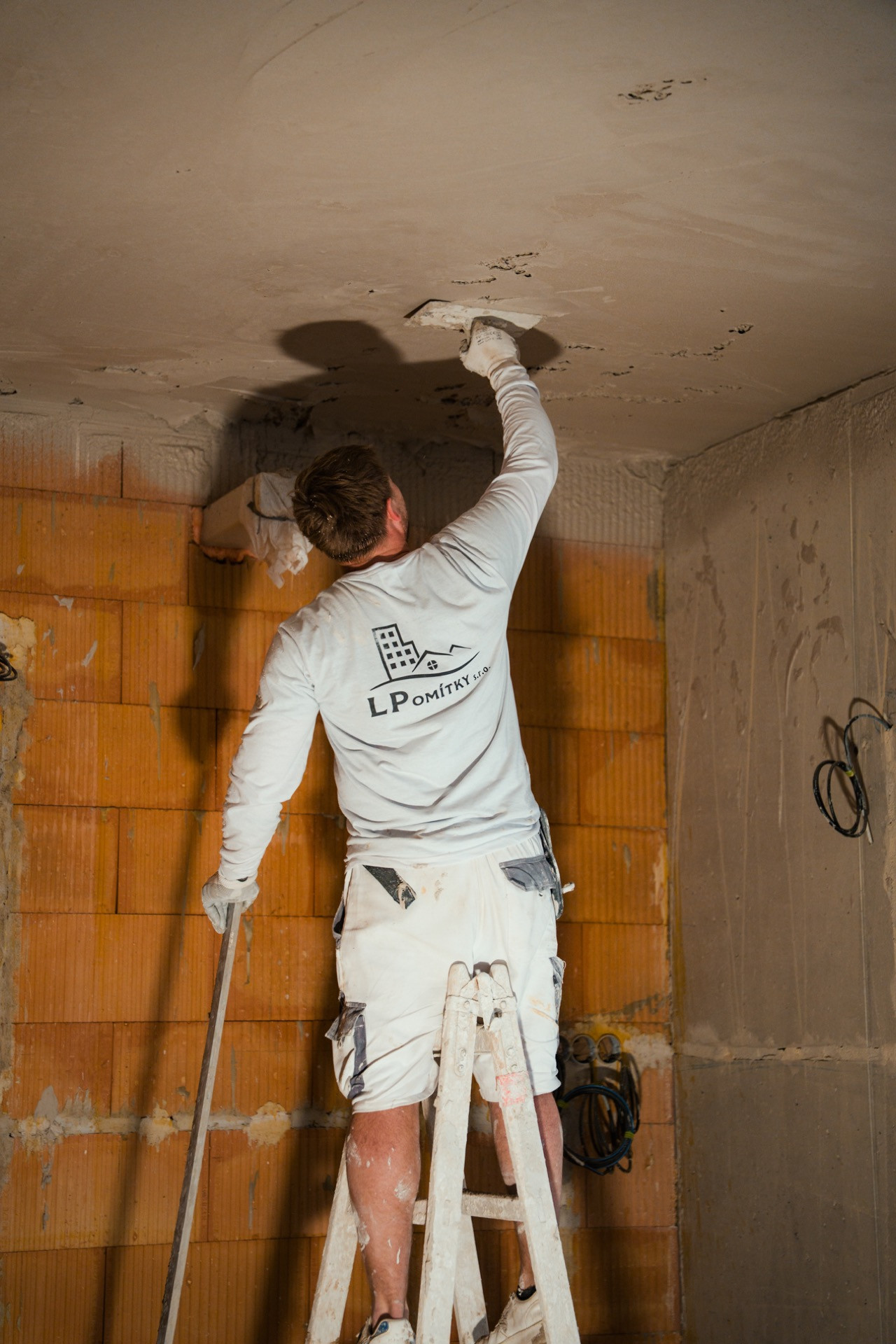 Professional construction site detail showing focused craftsmanship